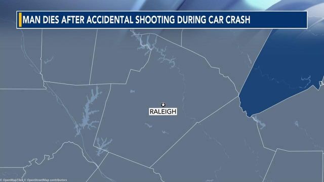Man dies after accidental shooting during car crash  