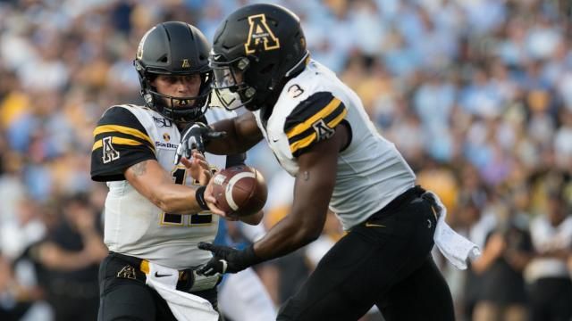 Quarterback Zac Thomas (12) of the Appalachian State Mountaineers. App State travels to Chapel Hill, N.C. to face off against the Tar Heels for a rare, in-state match-up. The App State Mountaineers outlasted the Tar Heels, winning the game with a final score of 34 - 31. (Photo By: Baird Photography / WRALSportsFan) Quarterback Zac Thomas (12) of the Appalachian State Mountaineers. App State travels to Chapel Hill, N.C. to face off against the Tar Heels for a rare, in-state match-up. The App State Mountaineers outlasted the Tar Heels, winning the game with a final score of 34 - 31. (Photo By: Baird Photography / WRALSportsFan)