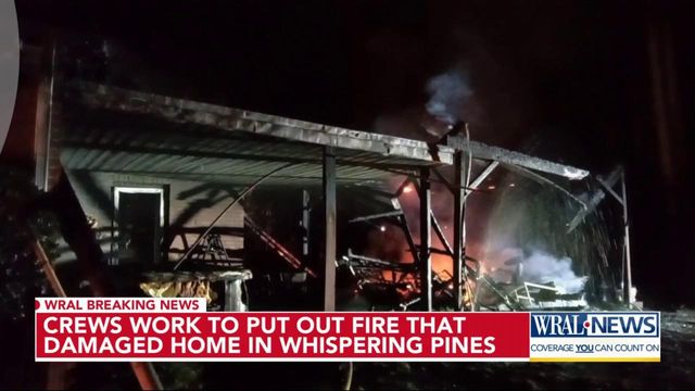 Crews work to put out fire after Moore County home goes up in flames