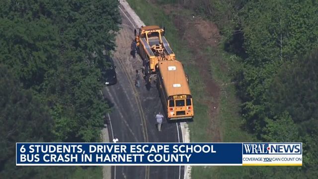 Six students, driver okay after school bus overturns in Harnett County