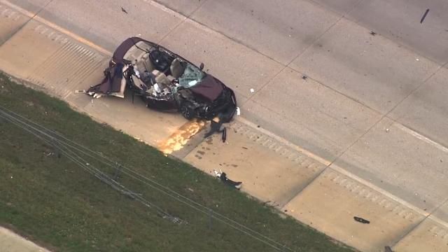 The car appeared to crash into a grocery truck on the interstate.