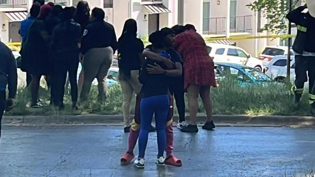 Crowd gathers outside Raleigh apartment complex where 13-year-old was shot and killed.