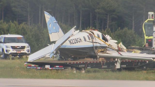 A plane that crashed on a runway at RDU on Wednesday, April 24, 2024, is towed away.