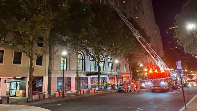 Fire at Sir Walter Apartments, dozens of residents line sidewalks in downtown Raleigh