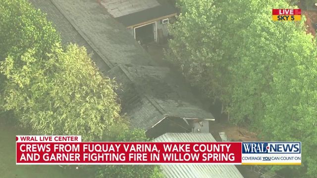 Crews from Fuquay-Varina, Wake County, Garner fighting fire in Willow Spring