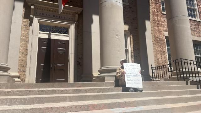 On Thursday, May 2, 2024, University of North Carolina at Chapel Hill professor Dr. Mark Peifer sat outside South Hall.
