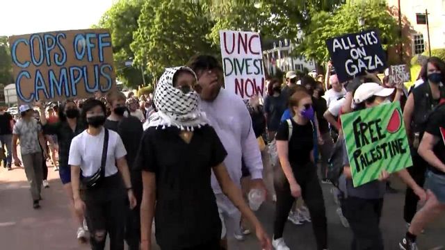 Pro-Palestinian protesters marching near UNC 