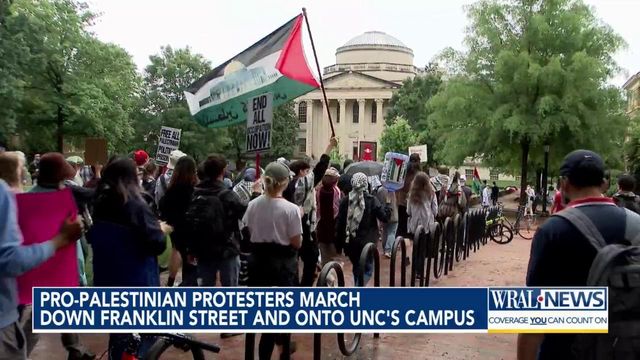 Pro-Palestinian protesters march down Franklin Street and onto UNC's campus