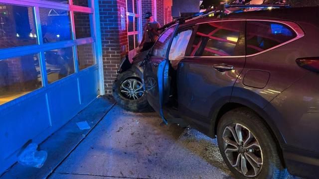 Driver crashes into Apex fire station after hitting several light posts 