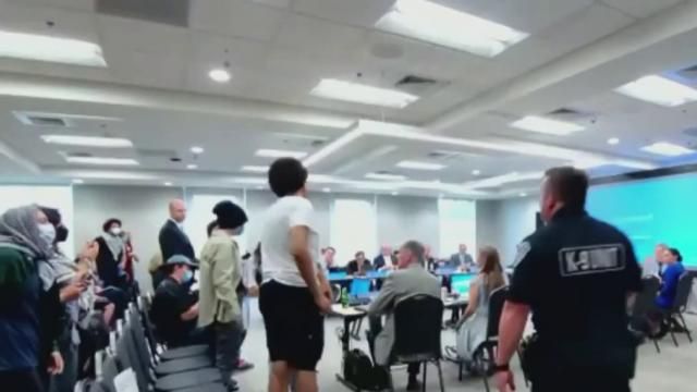 Protesters at UNC-Chapel Hill meeting