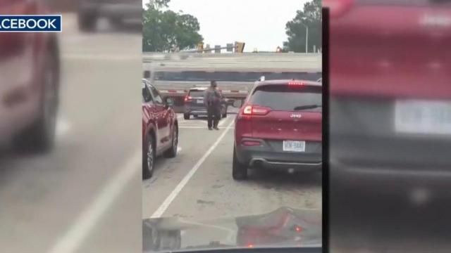 VIDEO: NC police officer helps driver off tracks seconds before train speeds past