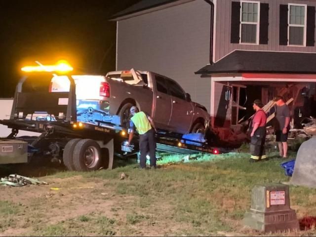 Pickup truck crashes into home in Cumberland County, hits new car in garage – WRAL News