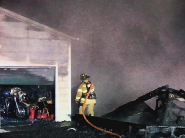 Fire in garage, workshop at Moore home damages pickup truck, motorcycle