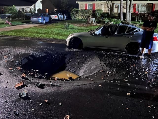 Burst water pipe leaves huge hole in the middle of street in Durham district