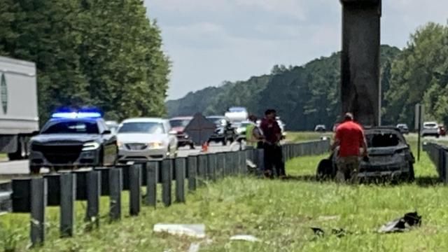 Woman dies after car hits bridge piling on I-40, catches fire in Sampson County 
