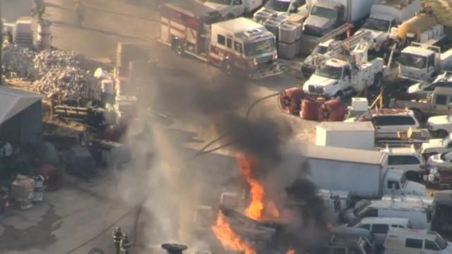 Scrap yard full of cars, construction material goes up in flames south of Wendell 