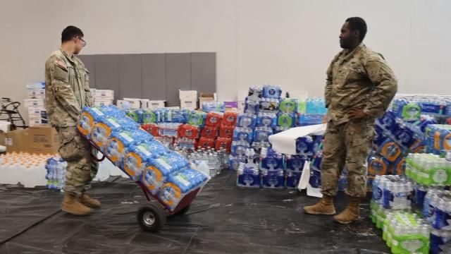 Soldiers preparing supplies for Helene victims