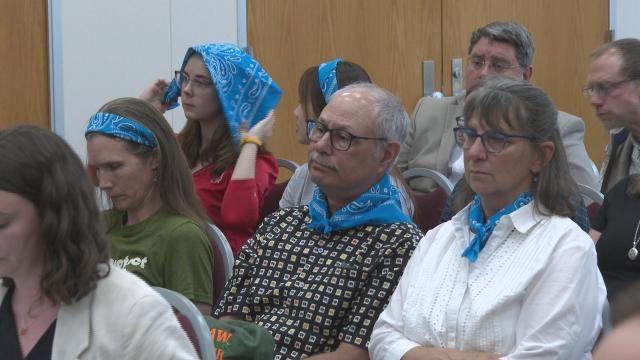Residents protested a draft PFAS rule at a state meeting Tuesday, saying it doesn't protect communities or drinking water. Commissioners delayed a vote, citing questions about the rule's cost analysis.