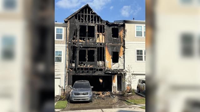 Day photo of fire at Castle Loch Ln. in Durham