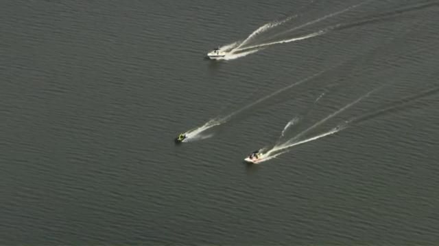 Search teams look for a missing boater at Jordan Lake on July 9, 2025.