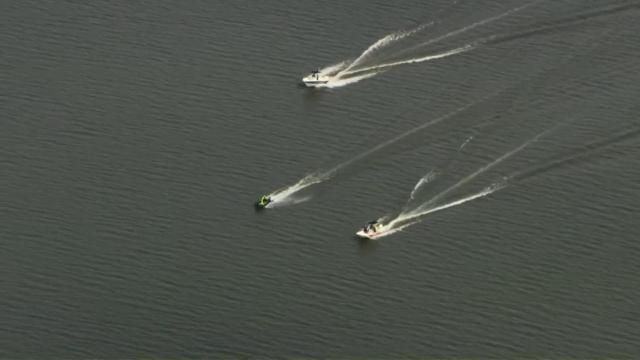 Search teams look for a missing boater at Jordan Lake on July 9, 2025.
