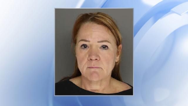 Annemarie Flanigan, the owner of the boat involved in a fatal crash on Harris Lake, was taken into custody and taken to Moore County Jail. 