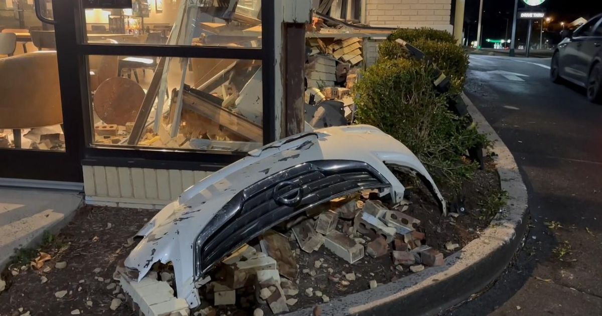 Durham Starbucks closed after car crashed into building, leaving behind bumper and damage