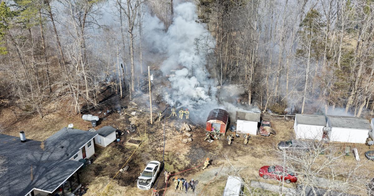 Durham County firefighters combat large building fire; cause unknown