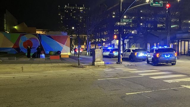 Large police presence on East Morgan Street near Marbles Kids Museum