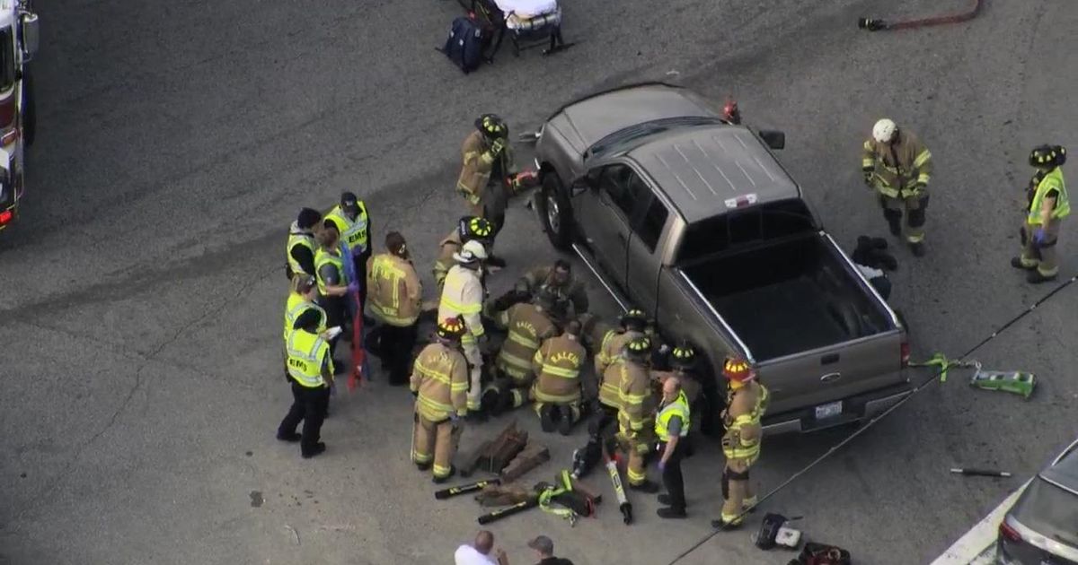 Jogger hit by pickup truck in Raleigh rescued from underneath vehicle by emergency crews