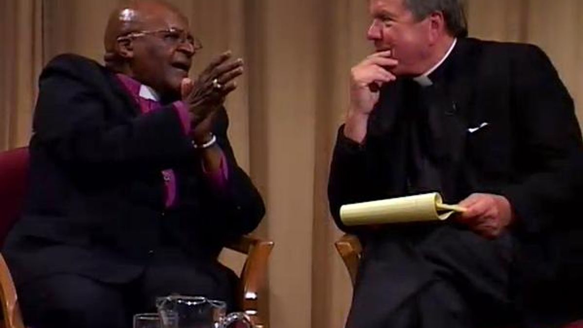 WRAL News anchor David Crabtree and Archbishop Desmond Tutu