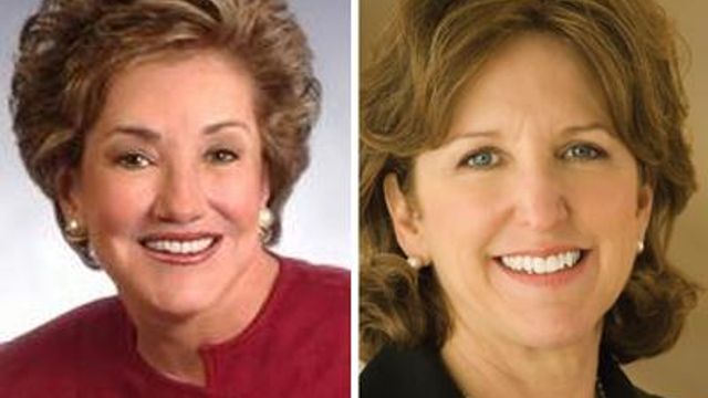 Dole, Hagan race across state in final day of campaign