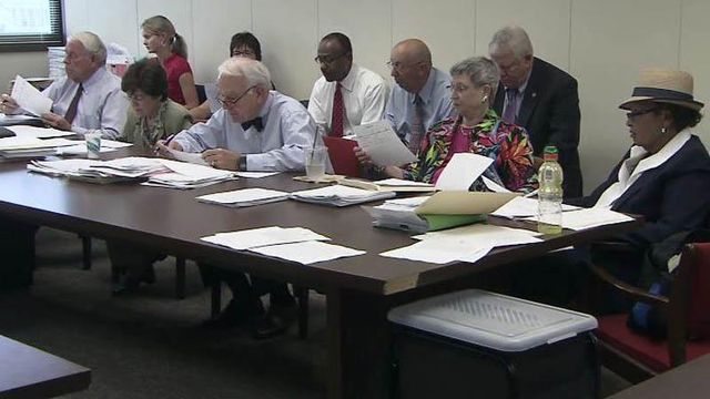 Lawmakers race to meet state budget deadline