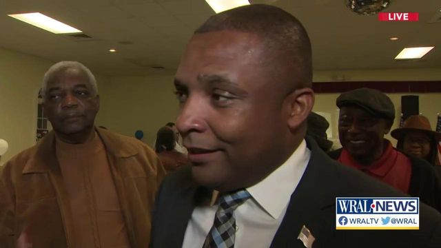 Newly minted Congressman Don Davis celebrates with supporters, proud mother