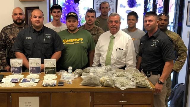 Granville Sheriff Brindell Wilkins with drug officers