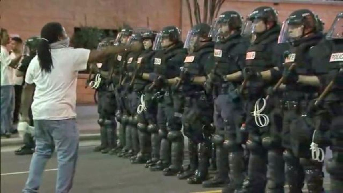 Man confronts officers at Charlotte protest
