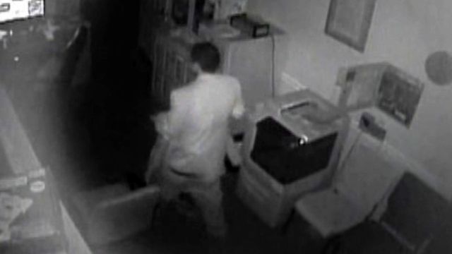 Caught on tape: Thief steals dead man's clothes