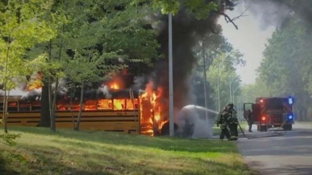 Driver pulls kids from burning school bus