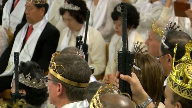 Couples take AR-15s to church ceremony