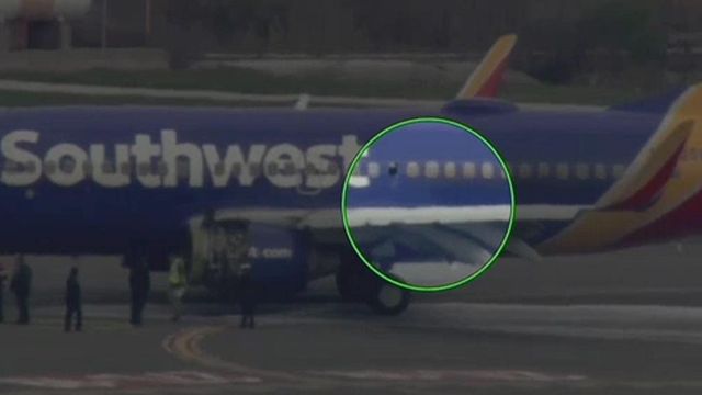 Blown engine knocks out window, forces emergency landing
