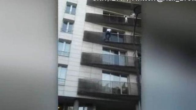 Real-life superhero: Man scales building, saves dangling child