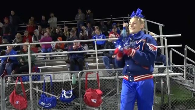 Lone cheerleader keeps high school games peppy