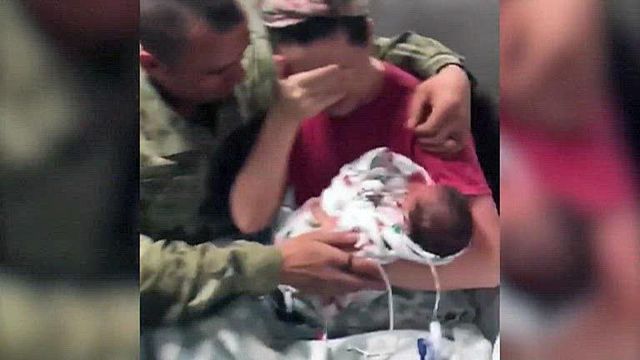 Soldier surprise! Military dad meets twin daughters in surprise homecoming