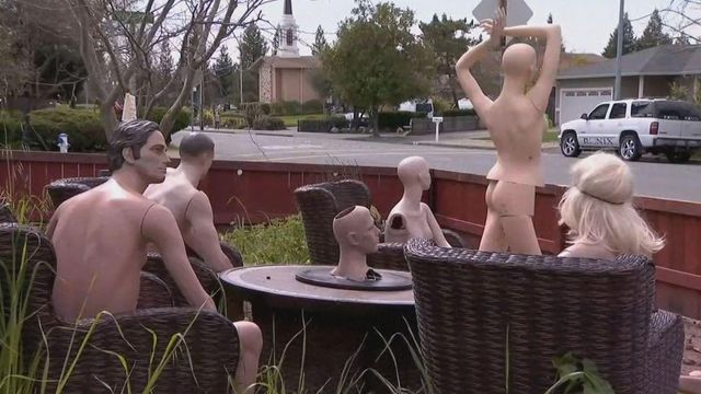 Man puts naked mannequins in front yard to protest fence
