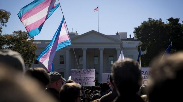 FILE-- Transgender flags during a transgender rights protest outside of the White House in Washington, Oct. 22, 2018. The Trump administration has formally proposed to revise Obama-era civil rights for transgender people in the nation’s health care system, eliminating “gender identity” as a factor in health care and leaning government policy toward recognizing only immutable characteristics of sex at birth. The Department of Health and Human Services published its proposed regulation on May 24, 2019. (Sarah Silbiger/The New York Times)