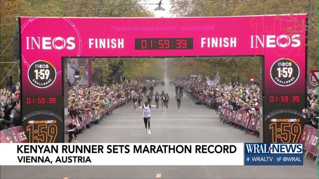 Kenyan runner sets record with under-2 hour marathon win