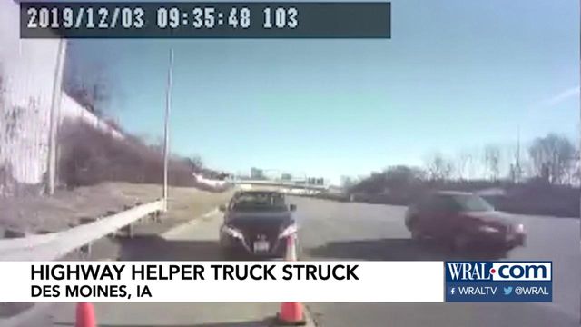 Highway helper in Iowa escapes after car crashes into truck