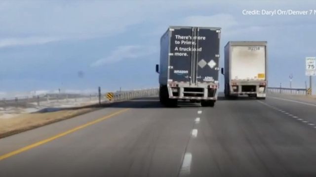 Big truck buffeted by windy conditions on Colorado highway