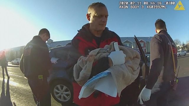 Body camera rolls as officer helps frantic couple with birth