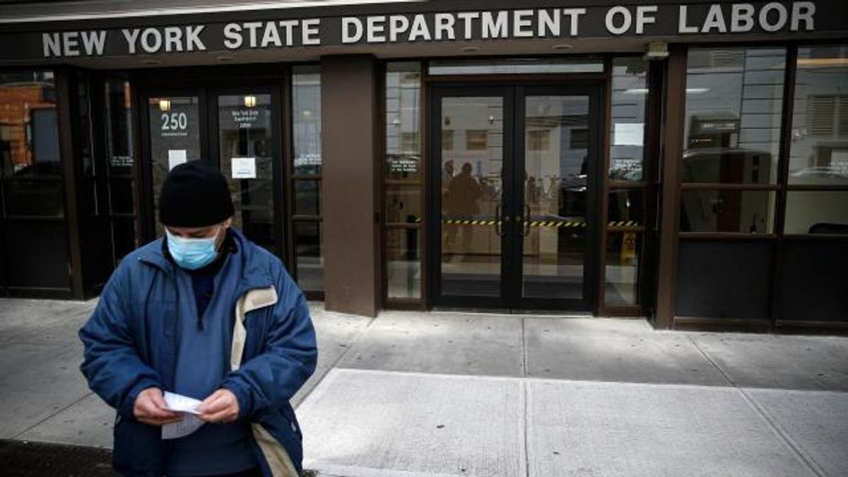 Visitors to the Department of Labor are turned away at the door by personnel due to closures over coronavirus concerns, Wednesday, March 18, 2020, in New York. 	